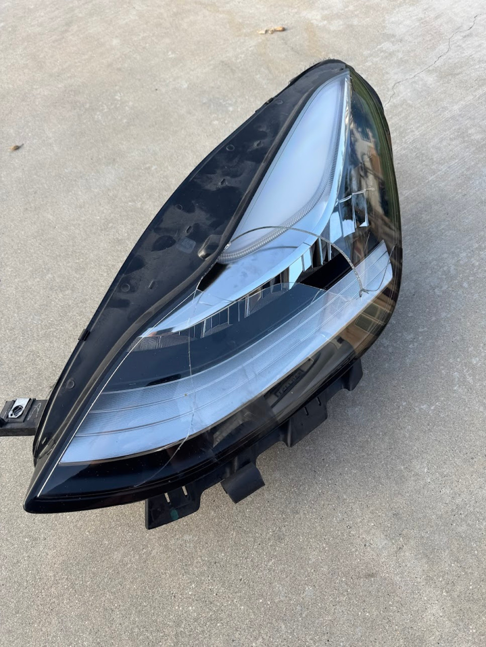 Tesla Model Y Left Headlight Driver Side Functional With Broken Glass - Used